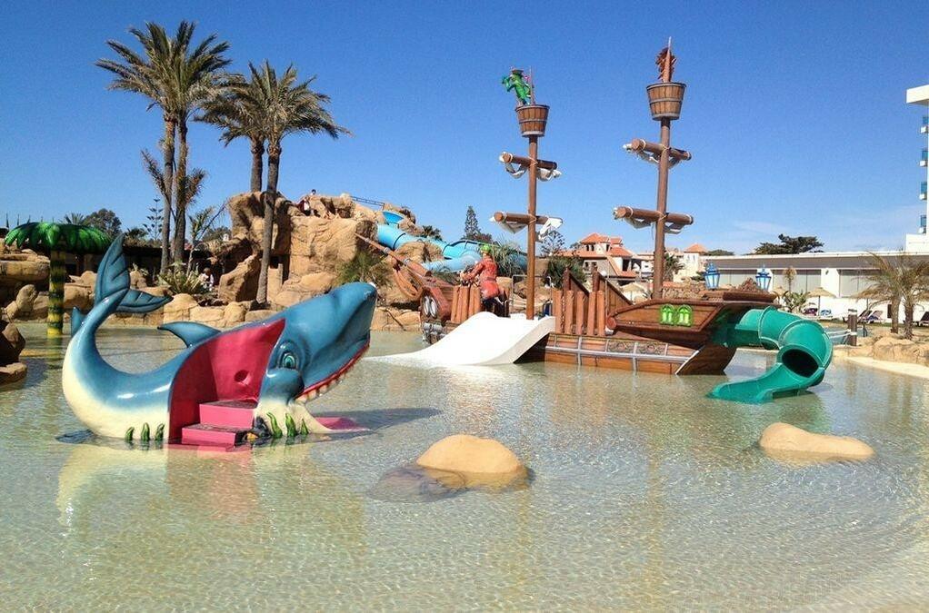 16058