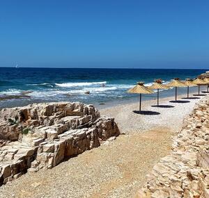23570